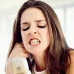 Angry woman with cell phone